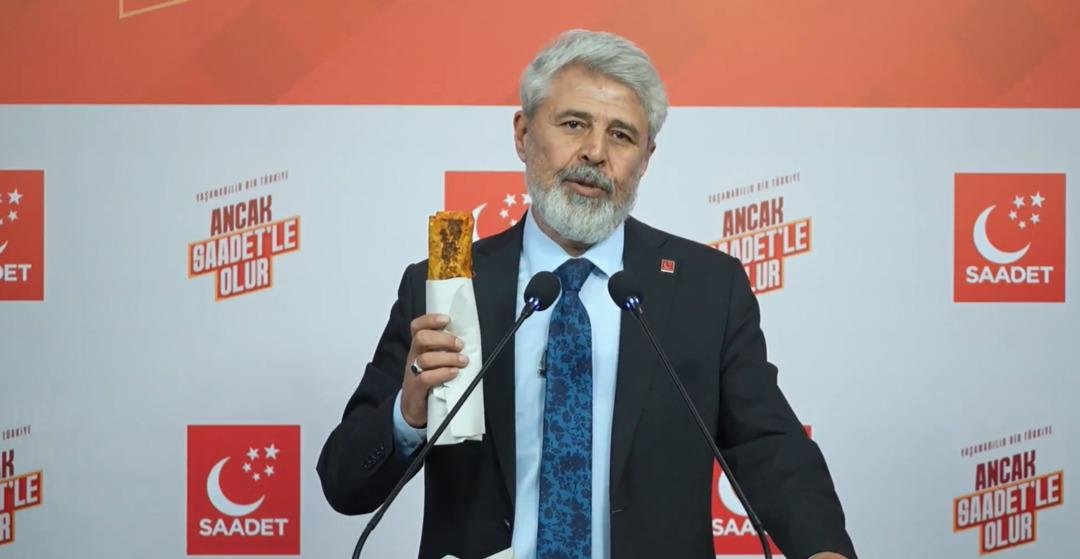 Kürsüye elinde tavuk dürümle çıktı! Enflasyon verilerinden sonra  dürümflasyon  hesabı gündem oldu: 